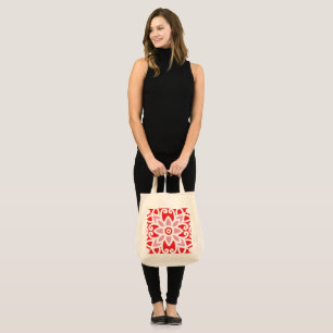 Tote Bag un motif rouge et blanc avec une fleur