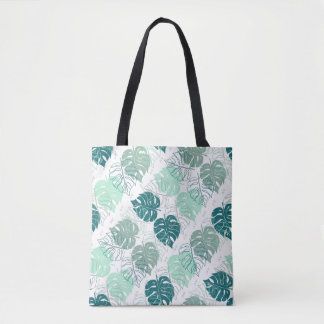 Tote with diagonal tropic leaf pattern