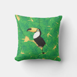 Toucan and banana leaves throw pillow