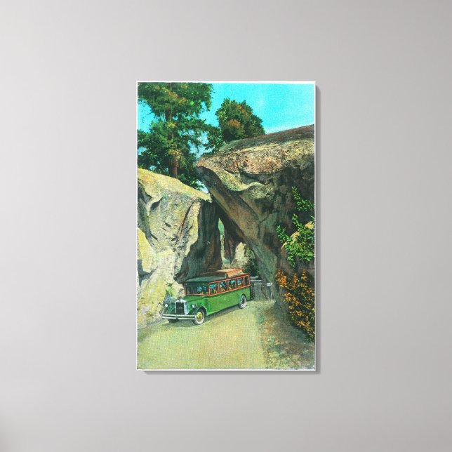 Tour Bus Under the Arch Rock on El Portal Road Canvas Print (Front)