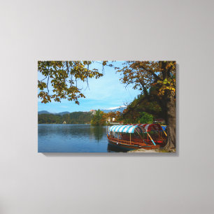 Tourist boats in Lake Bled in autumn Canvas Print