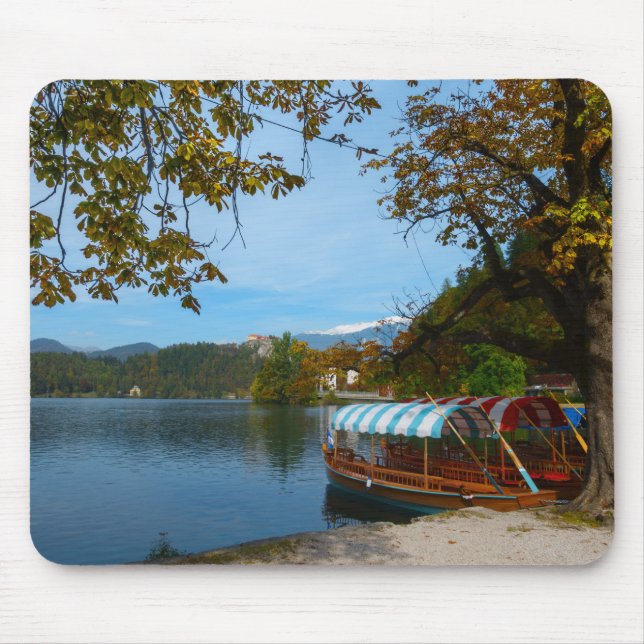 Tourist boats in Lake Bled in autumn Mouse Pad (Front)