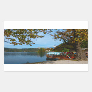 Tourist boats in Lake Bled in autumn Sticker