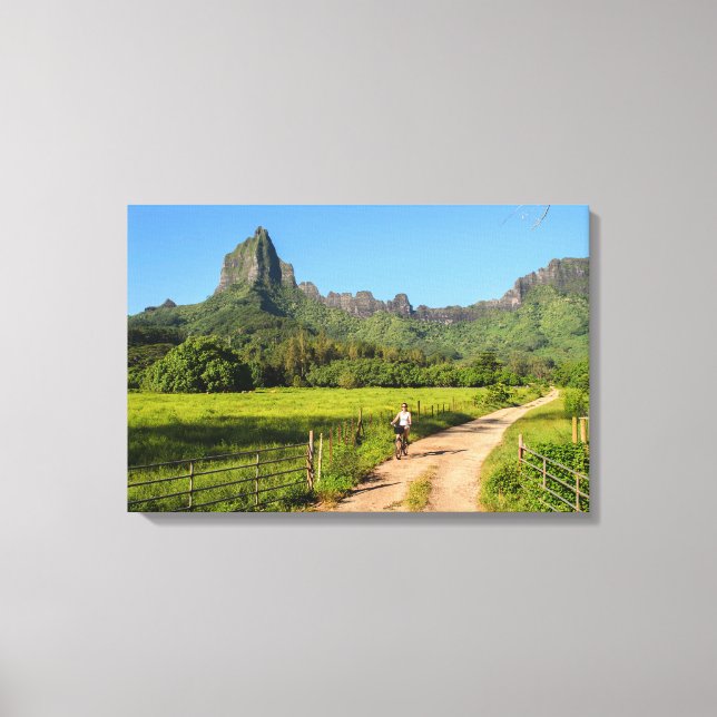 Tourist cycling on tropical Moorea canvas print (Front)