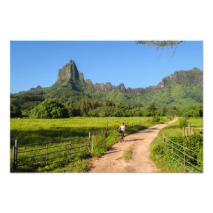 Tourist cycling on tropical Moorea photo print
