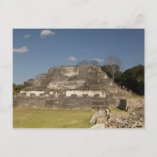 Tourist hiking up ruin postcard