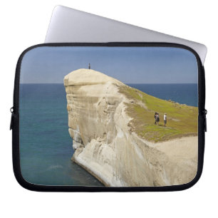 Tourists on cliff top at Tunnel Beach Laptop Sleeve