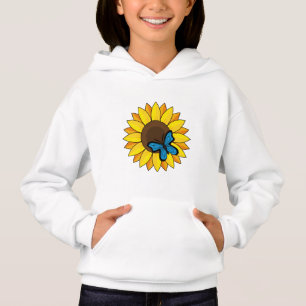 Tournesol et papillon bleu