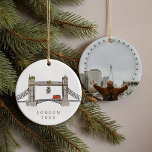 Tower Bridge London Double Decker Christmas Photo  Ceramic Ornament<br><div class="desc">Whimsical Christmas tree ornament featuring a Tower Bridge illustration with mistletoe and a double decker bus as a special touch. Turn it over and add your favourite photo from your London trip as a special momento!</div>