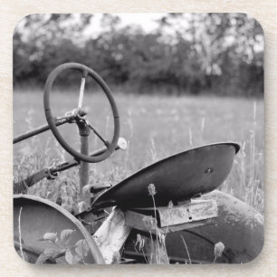 Tracteur dans les Dessous de verre à herbe longue