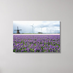 Traditional and modern windmill in Holland canvas