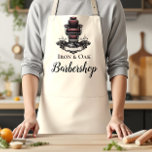 Traditional Barber Tools Classic Grooming Apron<br><div class="desc">A bold, classic barbershop design featuring illustrated grooming tools like scissors, razors, clippers, and combs arranged in a striking vintage composition. The deep charcoal background with subtle metallic tones creates a strong, masculine aesthetic inspired by traditional barber culture. An elegant ornamental label frame in the center keeps the layout clean...</div>