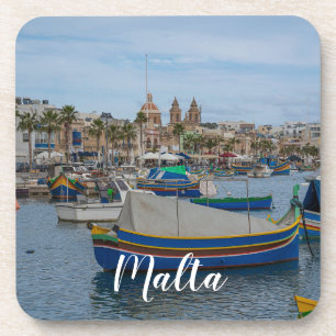 Traditional colourful fishing boats in Malta Coaster