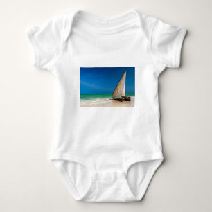Traditional fishing boat on the beach baby bodysuit