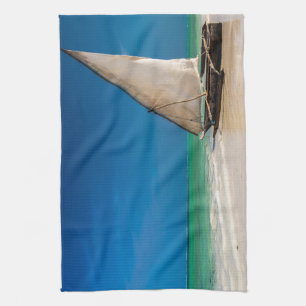 Traditional fishing boat on the beach kitchen towel