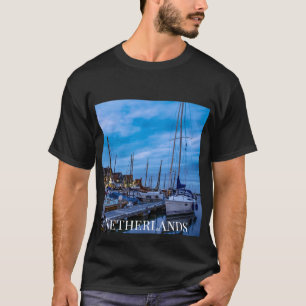 Traditional fishing town night scene T-Shirt