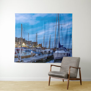 Traditional fishing town night scene tapestry