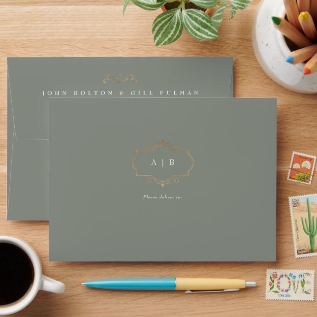 traditional gold crest monogram sage green wedding envelope (Desk)