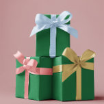 Traditional Green Wrapping Paper Sheets<br><div class="desc">Brighten up your Christmas gifts with this elegant and stylish Traditional Green wrapping paper from our Traditional Christmas Colours. This beautiful green wrapping paper is the perfect way to add a touch of charm and sophistication to your holiday gifts. The carefully selected colour is a rich and festive shade of...</div>
