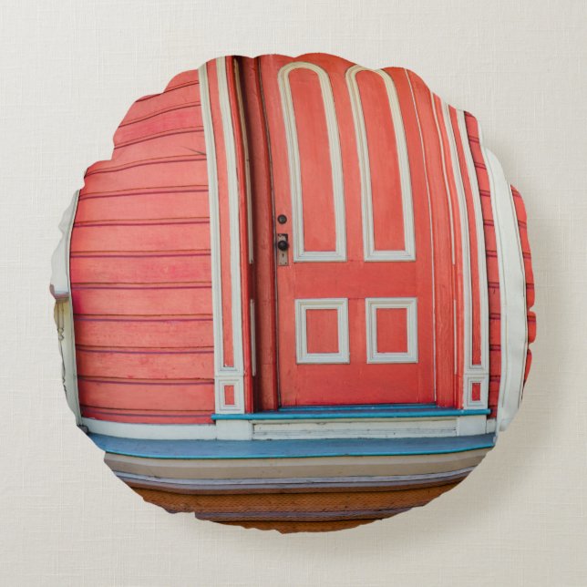 Traditional red painted wooden door and porchdoor, round pillow (Front)
