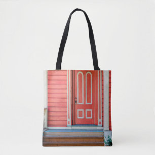 Traditional red painted wooden door and porchdoor, tote bag