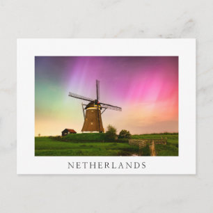 Traditional windmill under the Northern Lights Postcard
