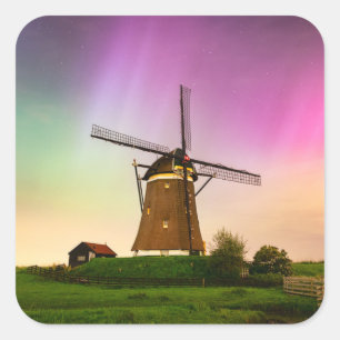 Traditional windmill under the Northern Lights Square Sticker