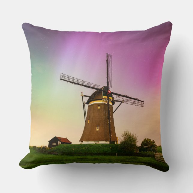 Traditional windmill under the Northern Lights Throw Pillow (Front)