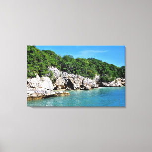 Tranquil Tropical Shoreline with Caves Canvas Print