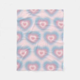 Trans flag colours on a blurred heart fleece blanket