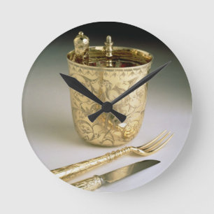 Travelling set of a knife, fork, spoon and beaker, round clock