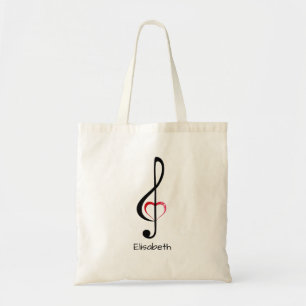 Treble clef with shiny pink heart tote bag