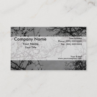 Tree branches on a dark sky. business card