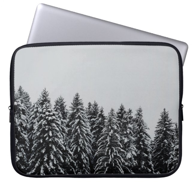 TREE COVERED SNOW UNDER CLOUDY SKY LAPTOP SLEEVE (Front)