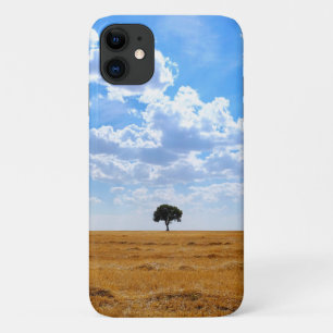 Tree in an harvested wheat field iPhone 11 case