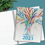 Tree of Life Personalized 2023 Planner<br><div class="desc">This unique Planner is decorated with a brightly coloured Tree of Life on a pale grey background. The original design was made in mosaic using tiny pieces of brightly coloured glass. Customize it with your name and year. To edit further use the Design Tool to change the font, font size,...</div>