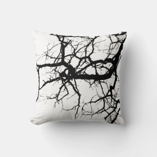 Tree's dark branches throw pillow