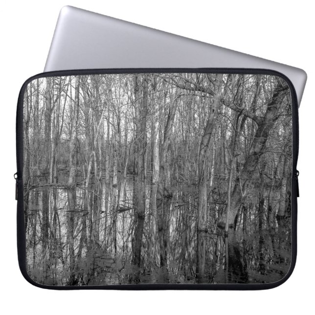 Trees in a forest in black and white. beauty in na laptop sleeve (Front)