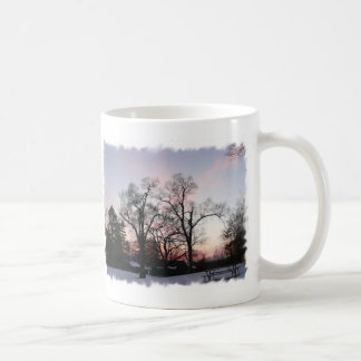 Trees with a sunset coffee mug