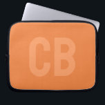 Trend Colour Fresh Tangerine Laptop Sleeve<br><div class="desc">Introducing the trendy spring colour: Fresh Tangerine. Modern and stylish Laptop Sleeve with customizable monogram in a minimalist light orange font. Its simple and clean design in a solid colour offers a timeless and classic appeal. Explore our spring trend colours for more products in the same colour or discover other...</div>