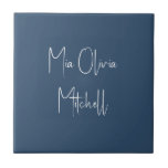 Trend Colour Serious Blue Name Ceramic Tile<br><div class="desc">Introducing the trendy spring shade: Serious Dark Blue. Elevate your home decor with our modern and stylish ceramic tile, featuring a customizable name in a charming handwritten font in classic white, looking like a signature. Its elegant and minimalist design in solid colours exudes timeless appeal, making it perfect for personal...</div>