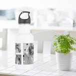 Trendy Collage Family Photo Black & White Initial 532 Ml Water Bottle<br><div class="desc">Introducing our Trendy Collage Five Family Photo Black & White with Initial in Centre . This personalized and stylish collage is the perfect way to showcase your family's cherished memories in a modern and elegant way. Featuring a sleek black and white colour scheme, this collage allows you to highlight four...</div>