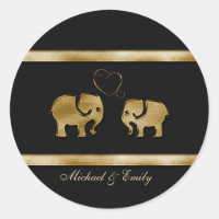 Trendy cute black /golden elephant in love