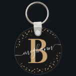 Trendy Girly Black Gold Name Script Monogrammed Keychain<br><div class="desc">Girly, elegant, trendy, modern, black and gold, monogram initial name script custom personalized monogrammed keychain. Featuring a monogram initial and a girly name script in a hand lettered calligraphy swash tail font and dotted circle frame around your monogram. Perfect feminine gift for sister, mother, girlfriend, birthday, wedding, bridal shower, sweet...</div>