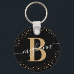 Trendy Girly Black Gold Name Script Monogrammed Keychain<br><div class="desc">Girly, elegant, trendy, modern, black and gold, monogram initial name script custom personalized monogrammed keychain. Featuring a monogram initial and a girly name script in a hand lettered calligraphy swash tail font and dotted circle frame around your monogram. Perfect feminine gift for sister, mother, girlfriend, birthday, wedding, bridal shower, sweet...</div>