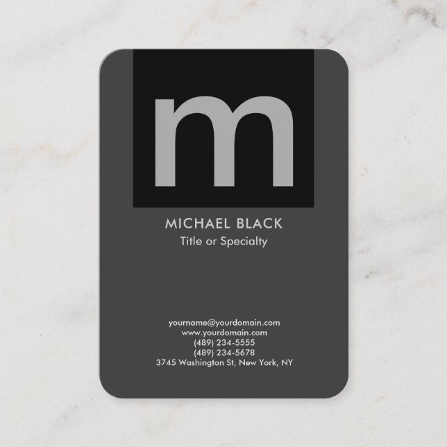 Trendy modern minimalist grey black monogrammed business card (Front)