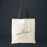 Trendy Monogram Name Script Sport and Hobby Tote Bag<br><div class="desc">Personalized Custom Monogram Name Tote Bag with editable text and wording for a list of her sports and favourite hobbies makes a fun and useful gift for the girl always on the go and in lots of extracurricular activities. This example reads "hockey, lacrosse, hiking, reading, drawing" but the text can...</div>
