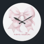 Trendy Pink Bow Personalized With Name Monogram Large Clock<br><div class="desc">Elevate your space with the Trendy Pink Bow Personalized With Name Monogram Large Clock, a stunning piece that blends timeless elegance with modern flair. Featuring a chic preppy coquette bow in a soft watercolor design, this clock embodies a vintage girly aesthetic that adds a touch of charm to any room....</div>