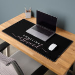 Trendy Pink Script Monogram On Black Desk Mat<br><div class="desc">An elegant modern trendy style monogrammed desk mat with a sans serif first name and an elegant pink script last name. For home or office.</div>