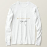 Trendy White Ribbon Wedding T-Shirt<br><div class="desc">A memorable keepsake. This pretty T-shirt features a lovely white watercolor ribbon alongside a contemporary font in a chic faux golden colour font. Optional text at the back to include each individual bridesmaid's name.</div>